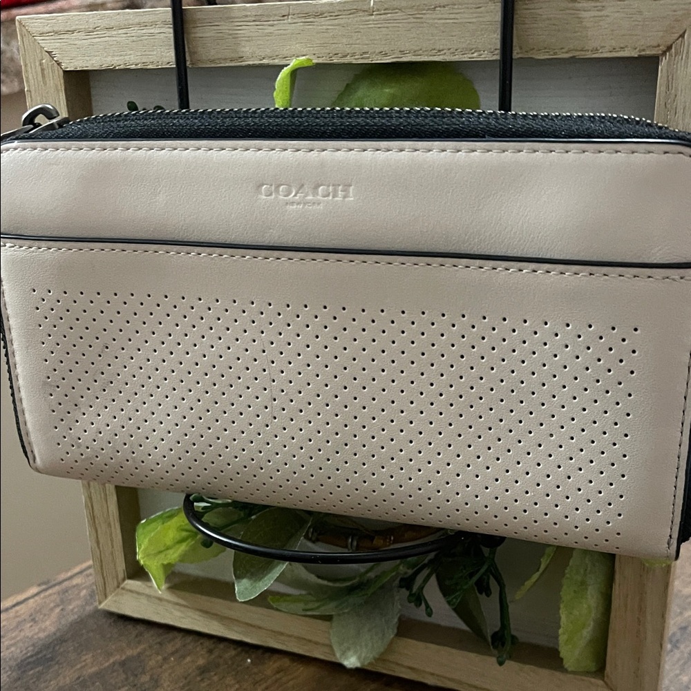 Coach Cream Perforated wallet
EUC